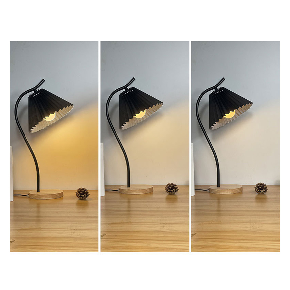 Drei Lampen mit schwarzen Schirmen auf einem Holztisch. Jede Lampe zeigt eine andere Lichttemperatur.