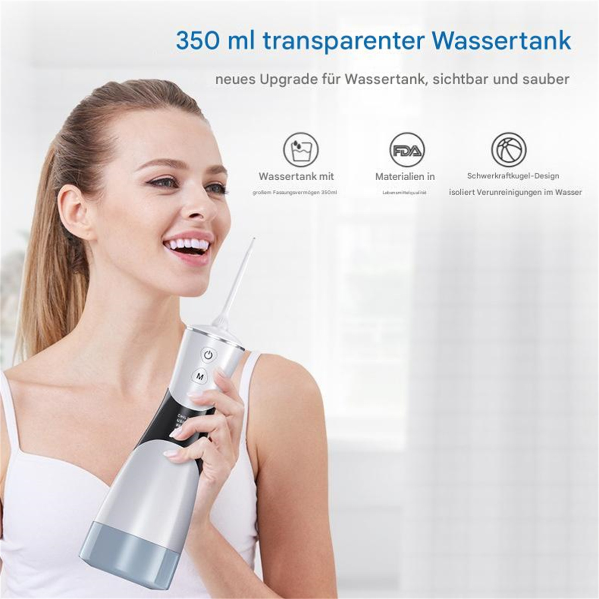 Eine lächelnde Frau, die einen weißen und grauen Wasser-Flosser hält. Der Text hebt den 350 ml transparenten Wassertank hervor.