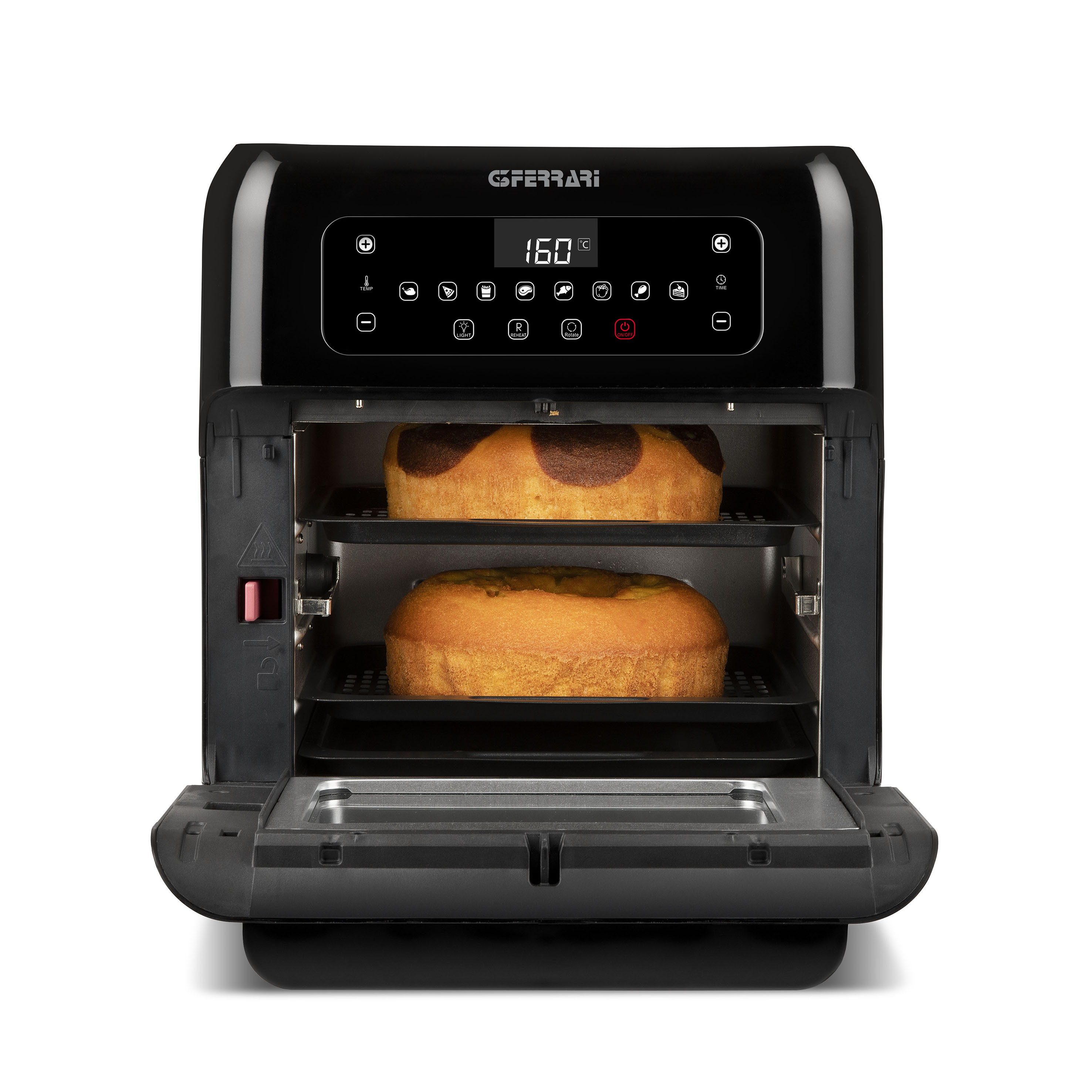 Czarna frytownica powietrzna z ciastami w środku i wyświetlaczem cyfrowym pokazującym 160 stopni.