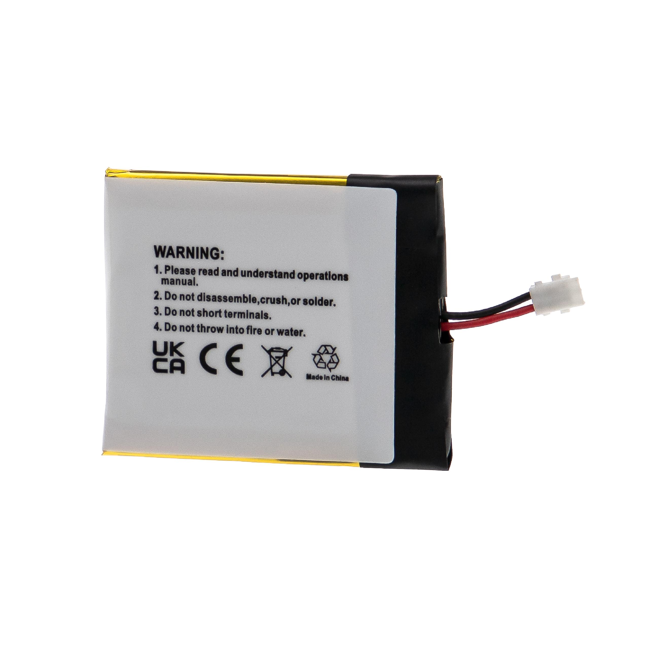 Ein weißes Batteriepack mit Warnhinweisen und Anschlussstiften, das Sicherheitshinweise und Zertifizierungen zeigt.