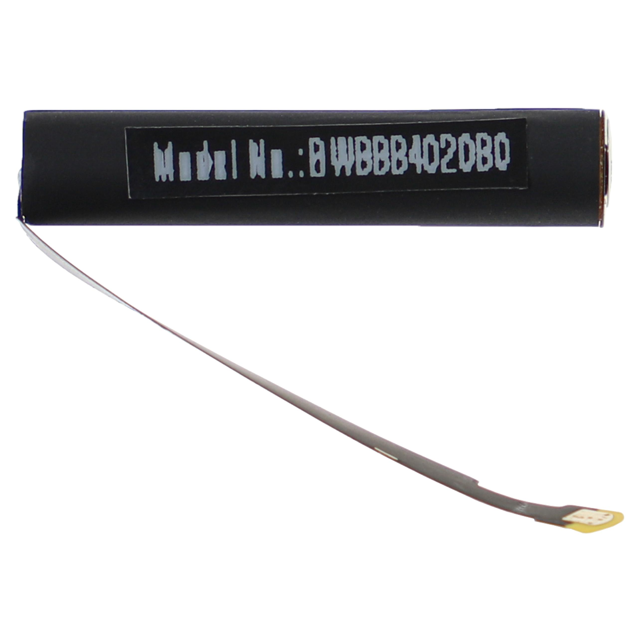 Ein schwarzes elektronisches Bauteil mit Etikett und einem dünnen, flexiblen Flachbandkabel.