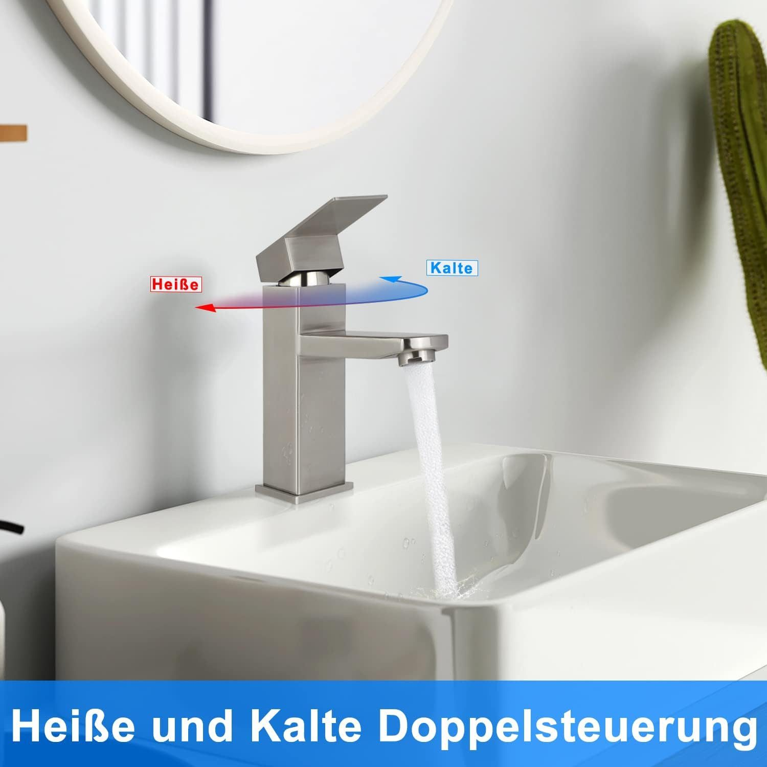 Eine silberne Armatur mit Warm- und Kaltwasseranzeigen, über einem weißen Waschbecken.
