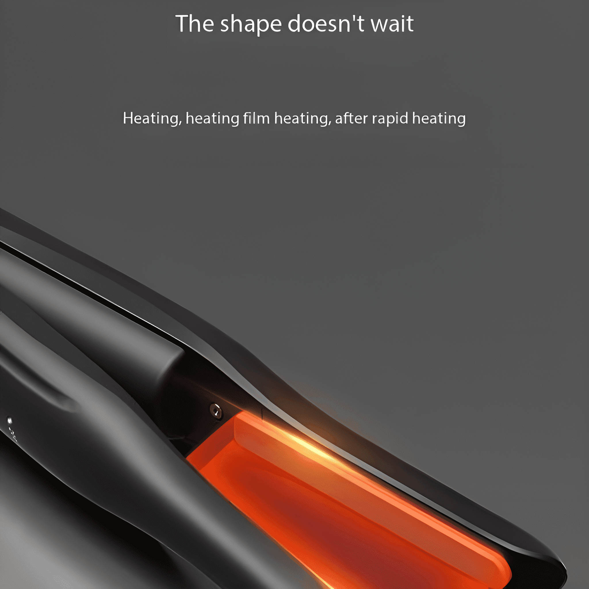Ein schwarzes Glätteisen mit einem orangefarbenen Heizelement auf dunklem Hintergrund.