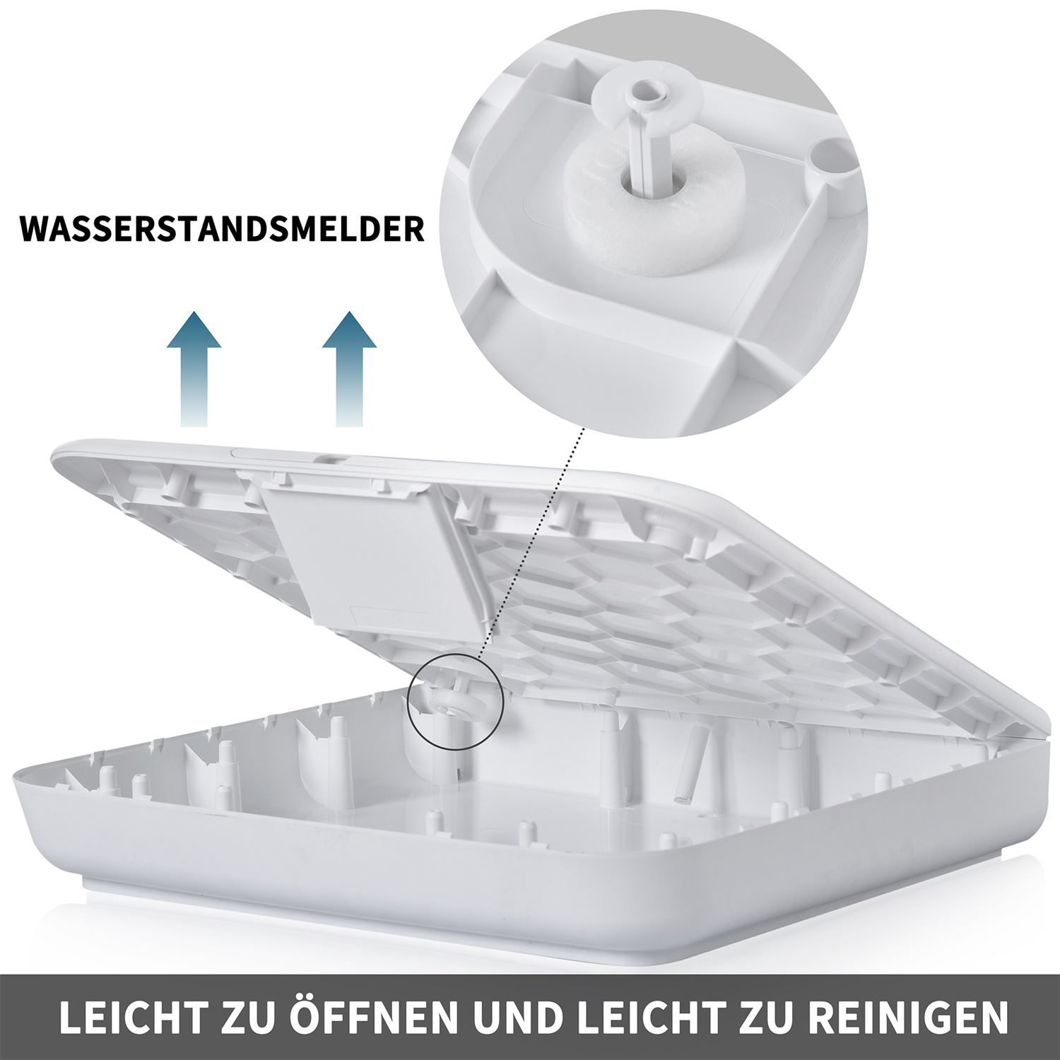 Ein weißes Kunststoffgerät mit offenem Deckel, Pfeilen und einem kleinen, detaillierten runden Einsatz.