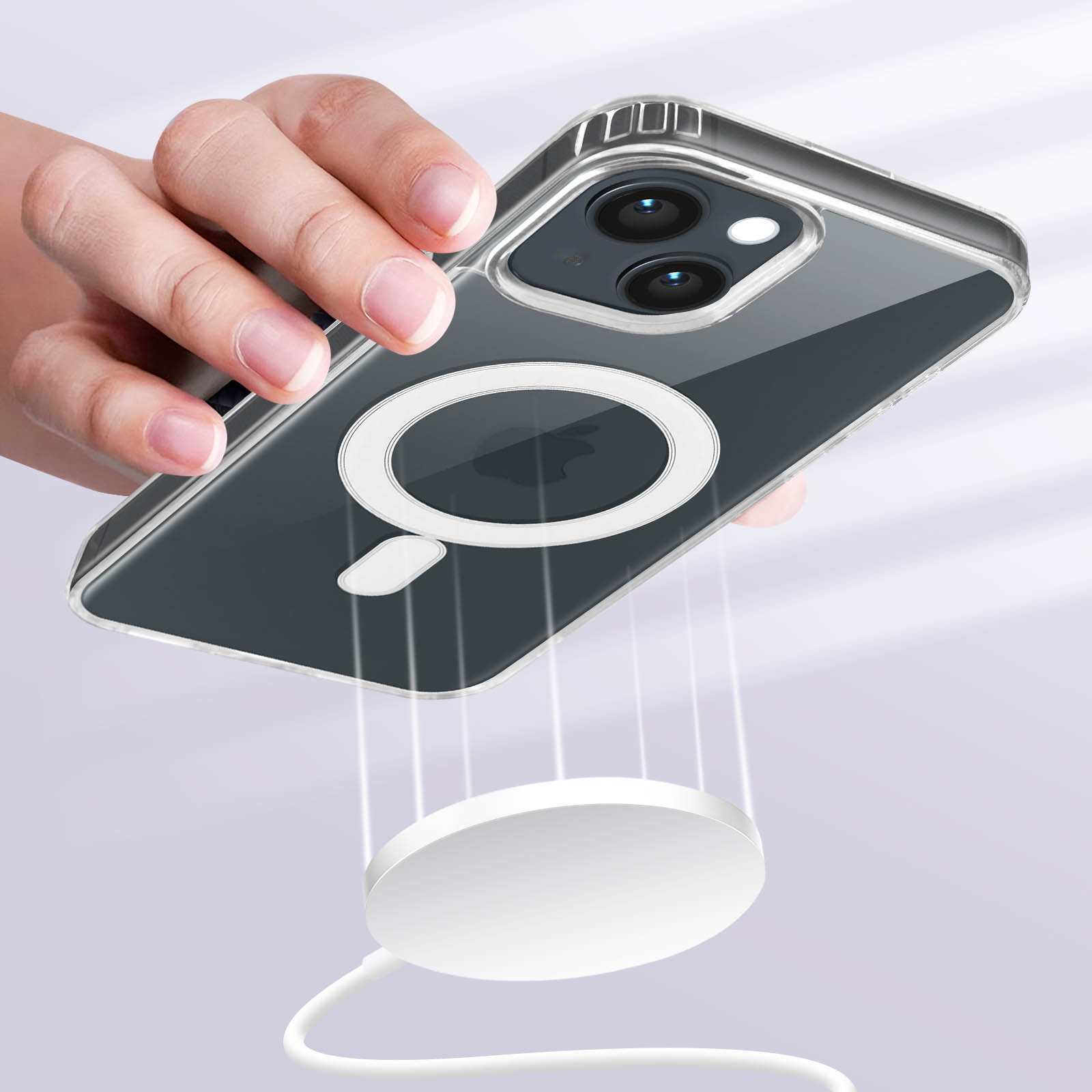 Telefono in custodia trasparente tenuto sopra un caricatore wireless bianco. Anello magnetico visibile.