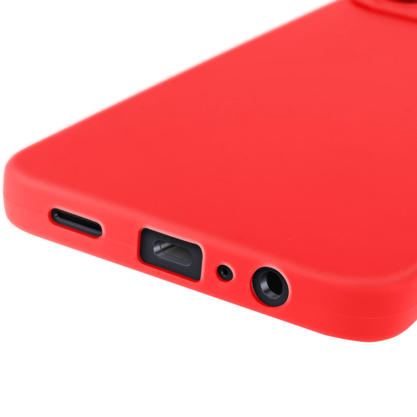 Primo piano di una custodia per telefono rossa con dettagli di porte e pulsanti. Su superficie piana.