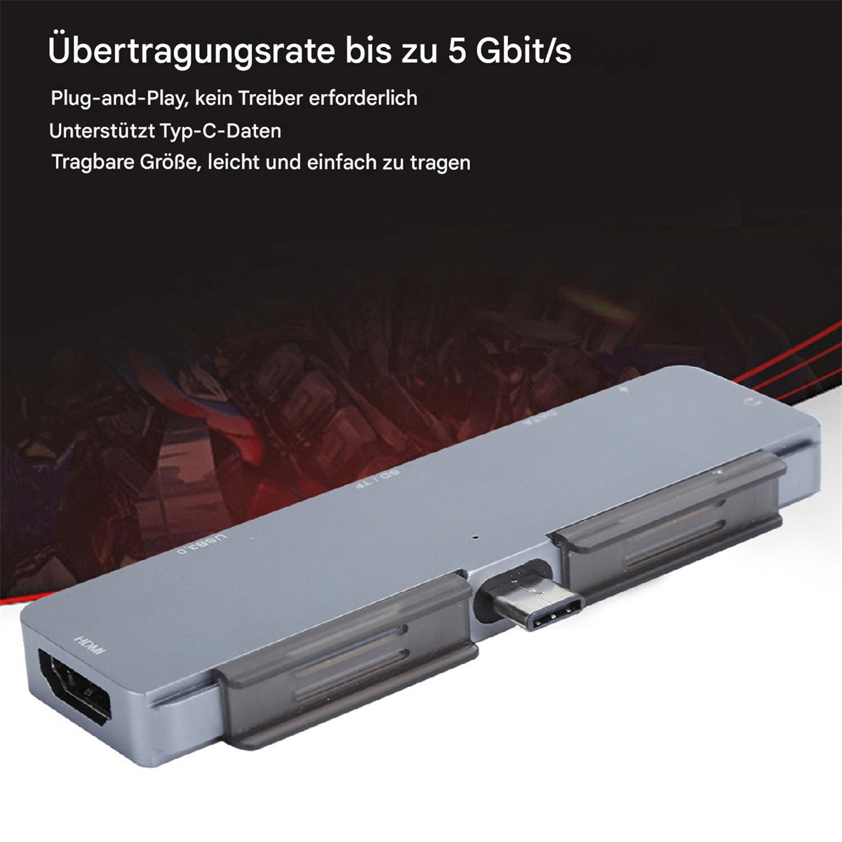 Grauer Hub mit HDMI- und USB-Anschlüssen. Text: „Plug-and-Play, kein Treiber erforderlich, unterstützt Typ-C-Daten“.