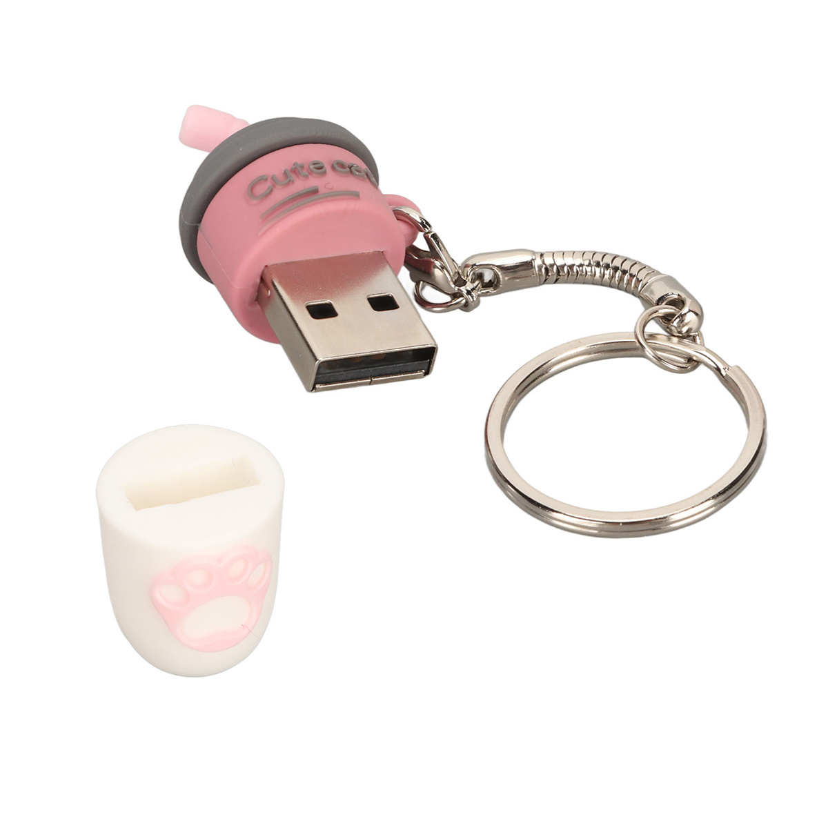 Ein rosa USB-Stick mit Schlüsselanhänger und weißer Pfotenabdruckkappe.