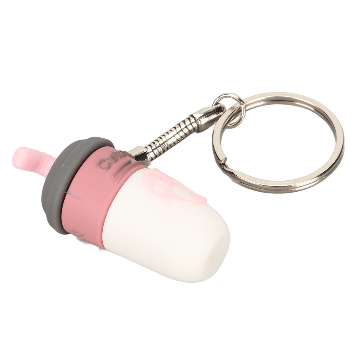 Ein Schnuller-Schlüsselanhänger, rosa Deckel und grauer Kragen, weiße Flasche, silberner Ring.