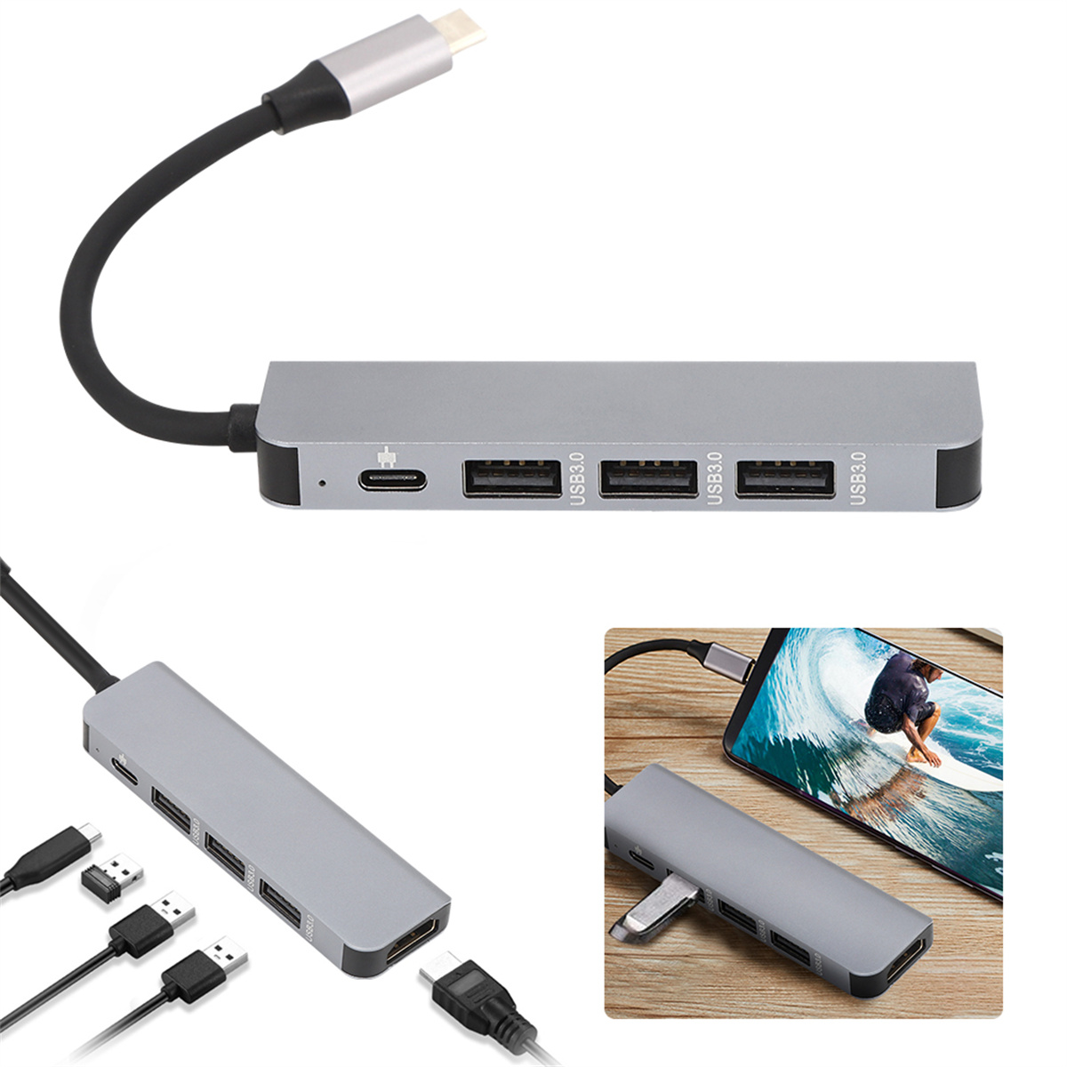 Ein silberner USB-Hub mit mehreren Anschlüssen, verbunden mit USB-C-Kabeln.