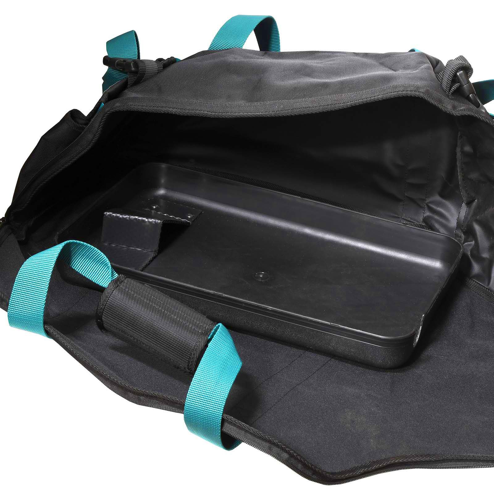 Schwarze und blaugrüne Reisetasche geöffnet, mit einer schwarzen Ablage innen.