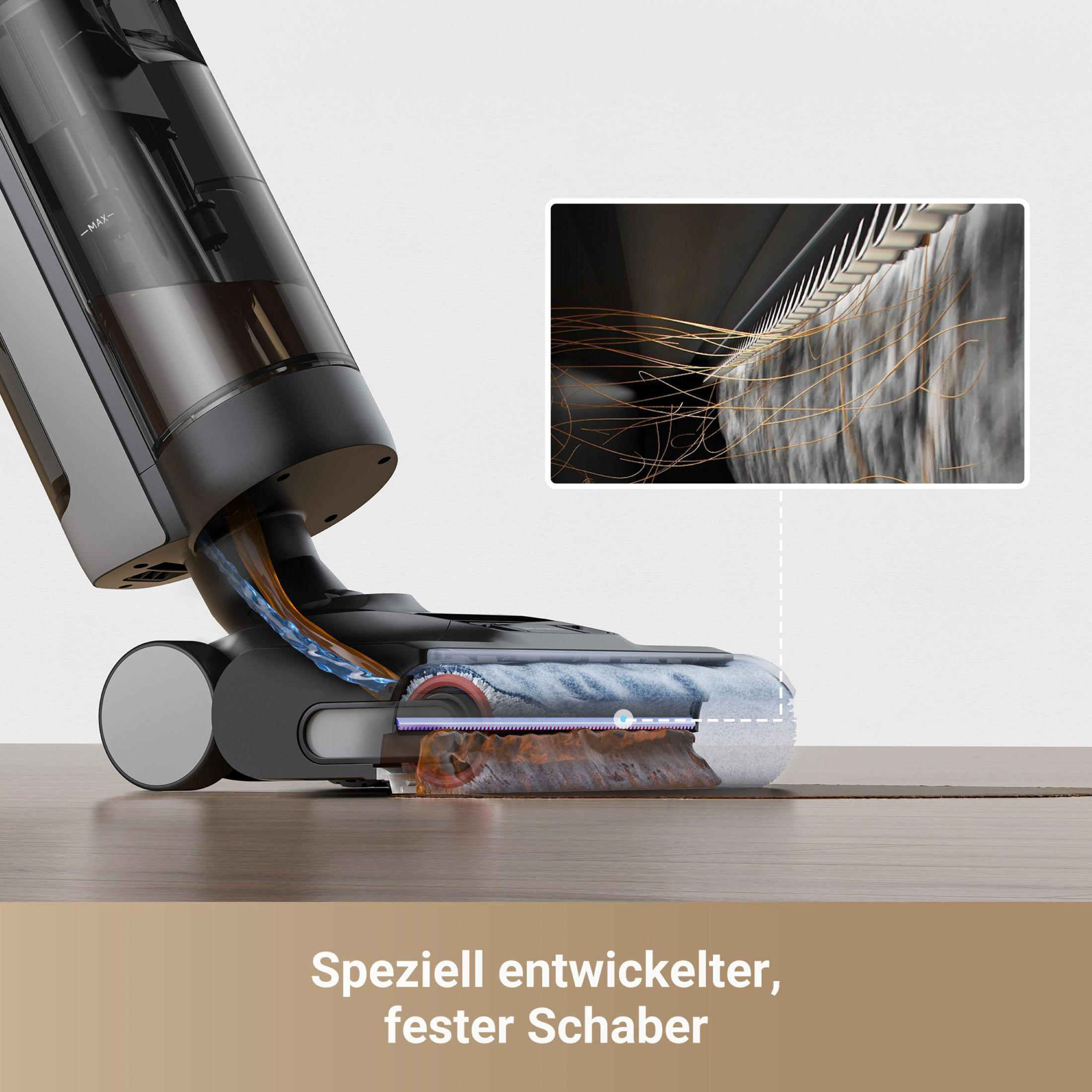 Staubsaugerkopf in Aktion, zeigt den Reinigungsprozess. Nahaufnahme der Bürste.