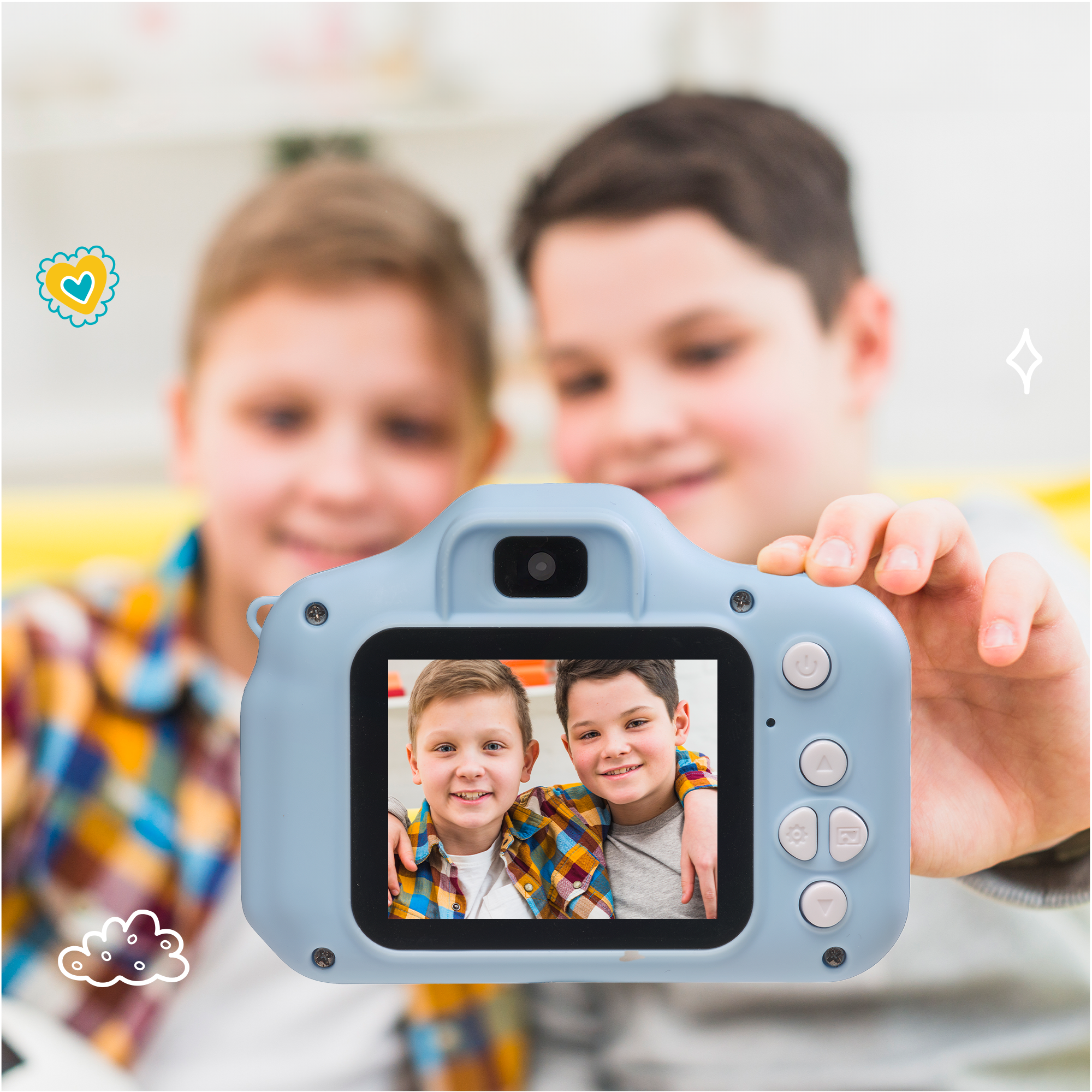 A blue camera displays two boys' image. Two boys are in the blurred background.