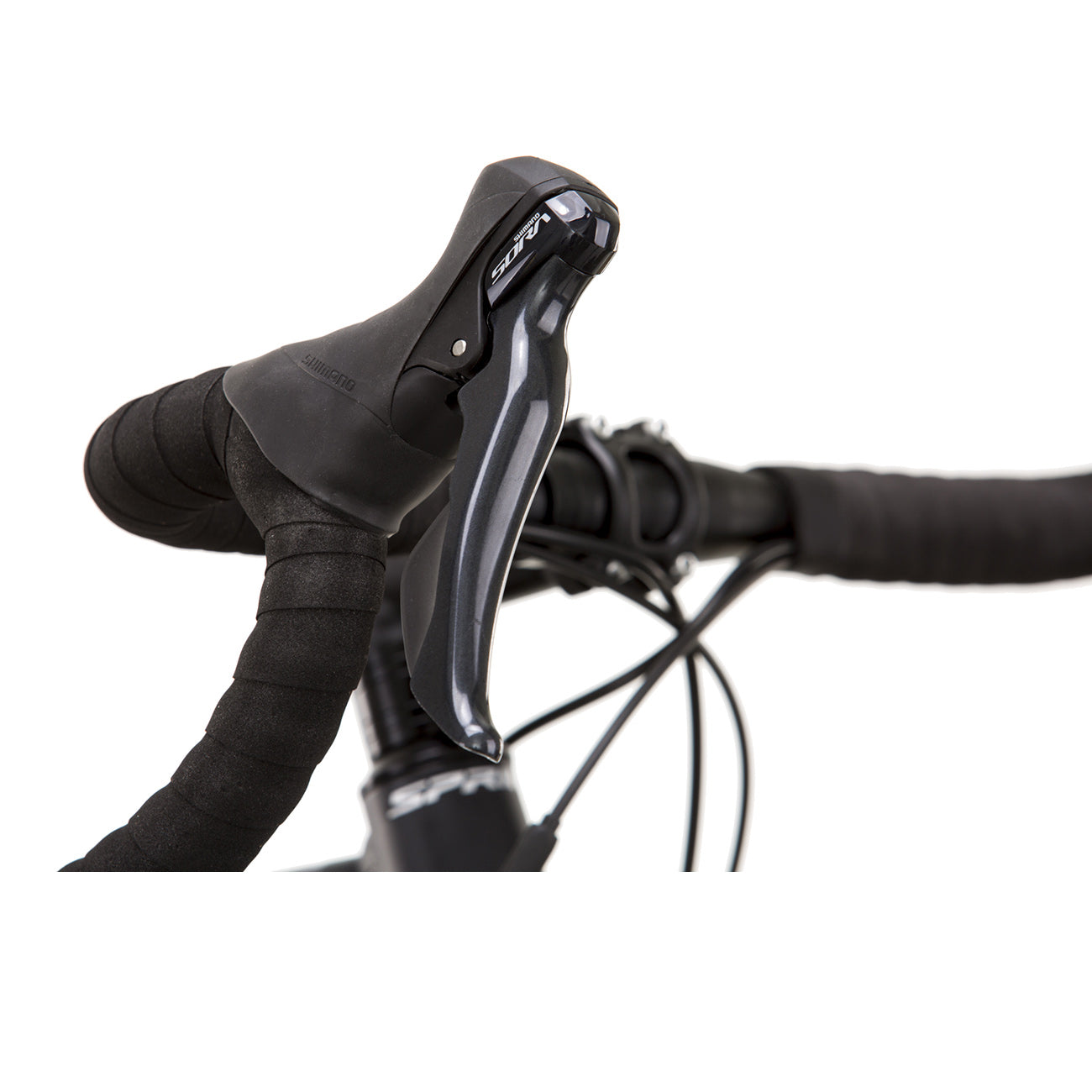 Nahaufnahme eines Fahrradlenkers mit Shimano Sora Schaltern. Der Hintergrund ist unscharf.