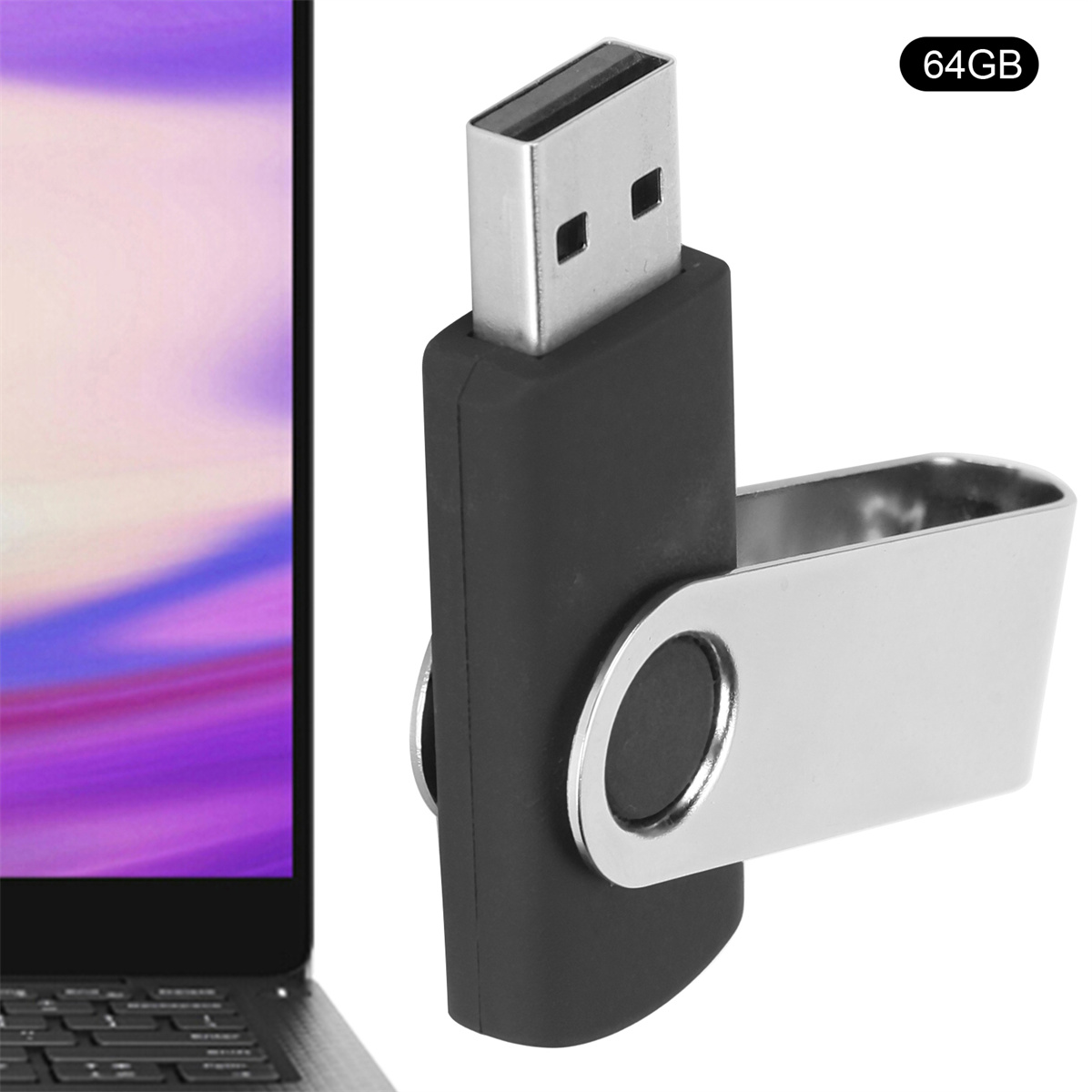 Ein schwarzer und silberner USB-Stick. Er ist eingesteckt und ein Laptop ist sichtbar.