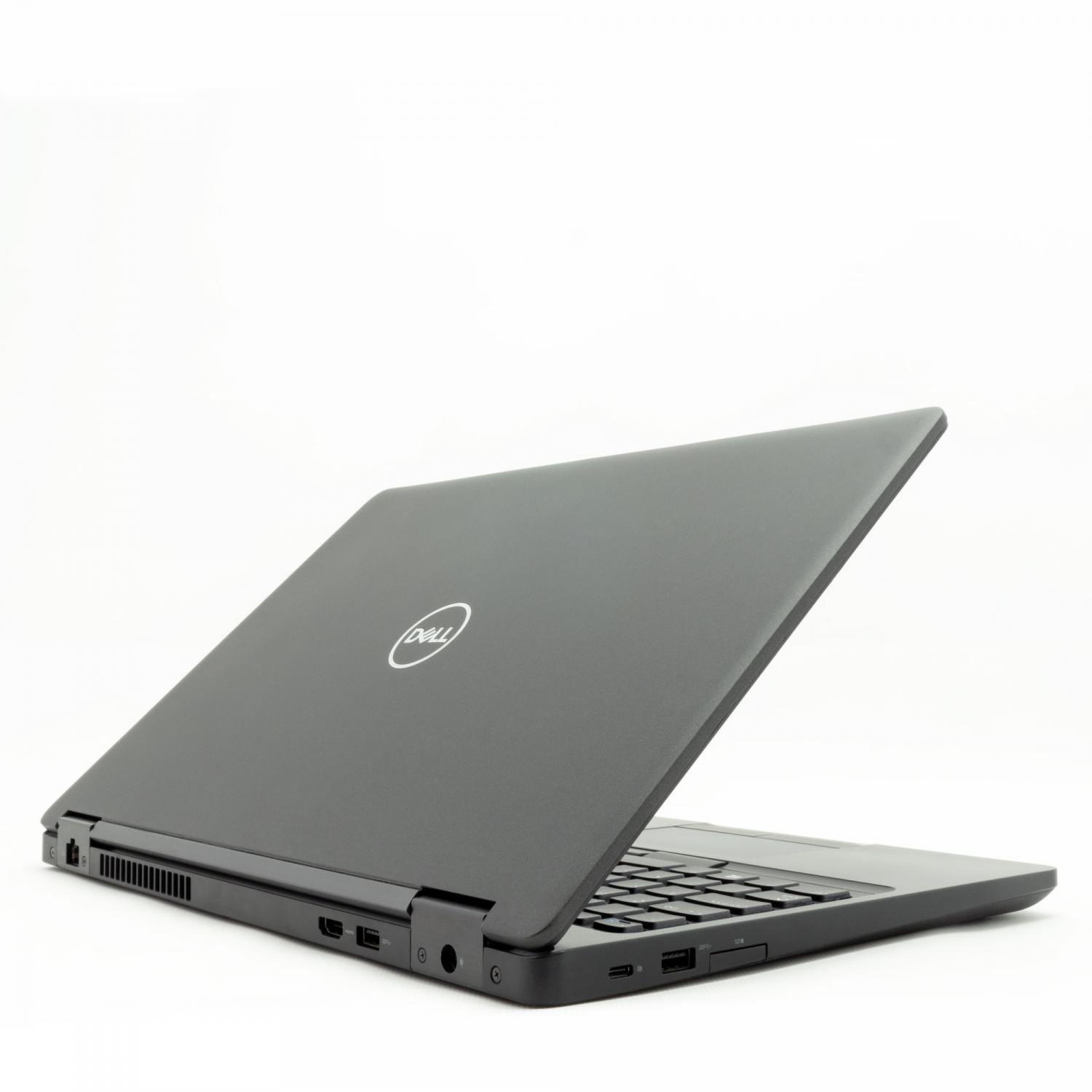 Ein schwarzer Dell Laptop ist auf einer weißen Oberfläche geöffnet. Das Dell Logo ist sichtbar.