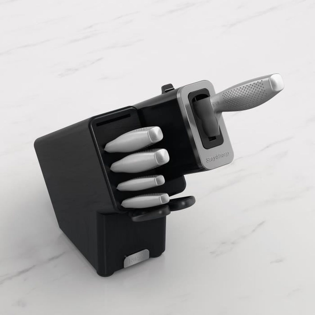 Ein schwarzer Messerschärfer mit silbernem Griff und mehreren Schärfschlitzen.