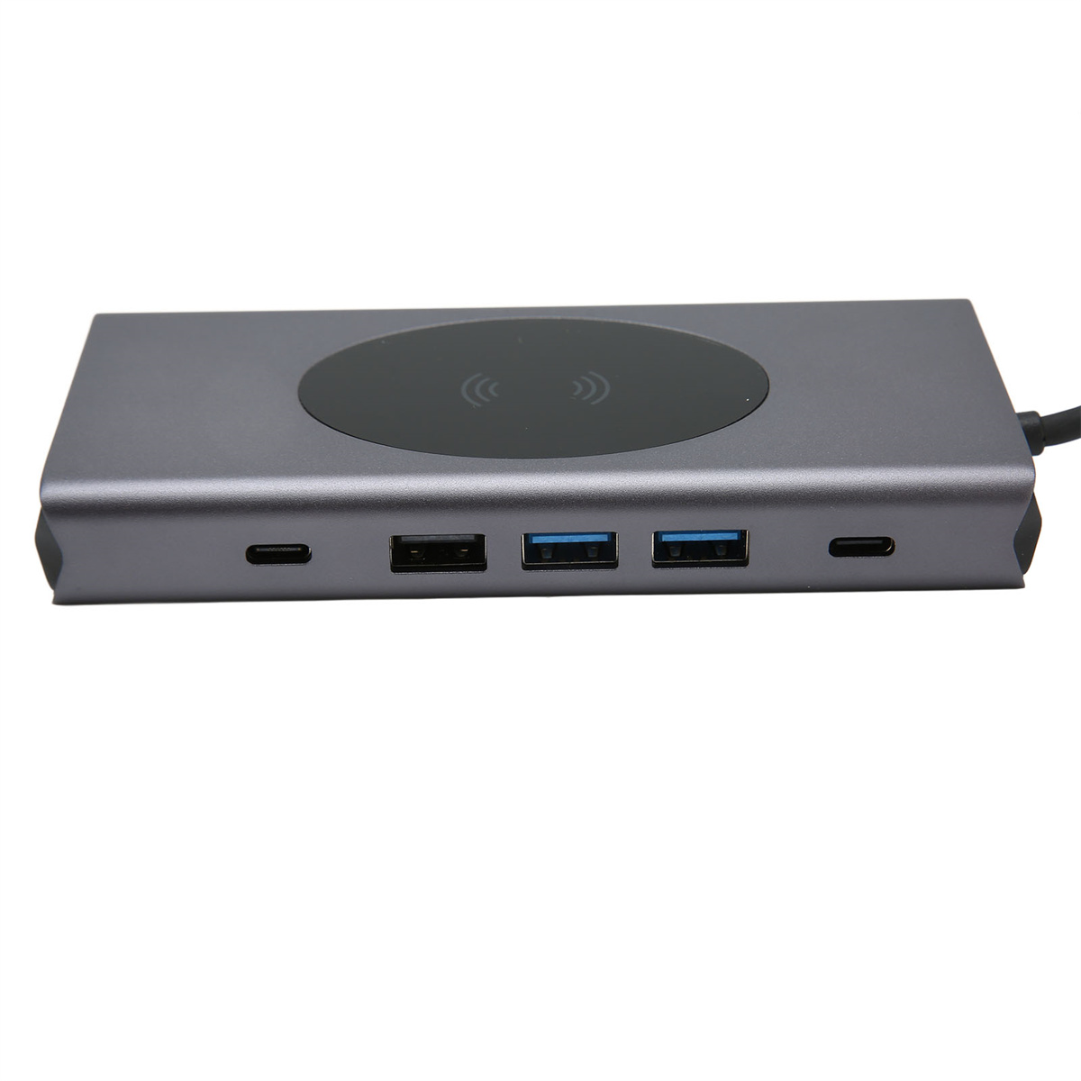 Grauer USB-Hub mit mehreren Anschlüssen und kabellosem Ladepad.