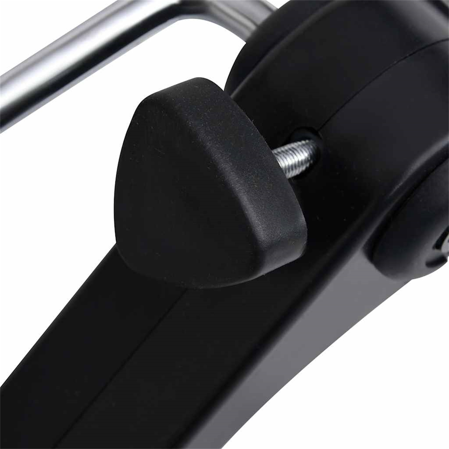 Nahaufnahme einer schwarzen Schraube mit schwarzer Kappe. Die Schraube ist in Metall geschraubt.