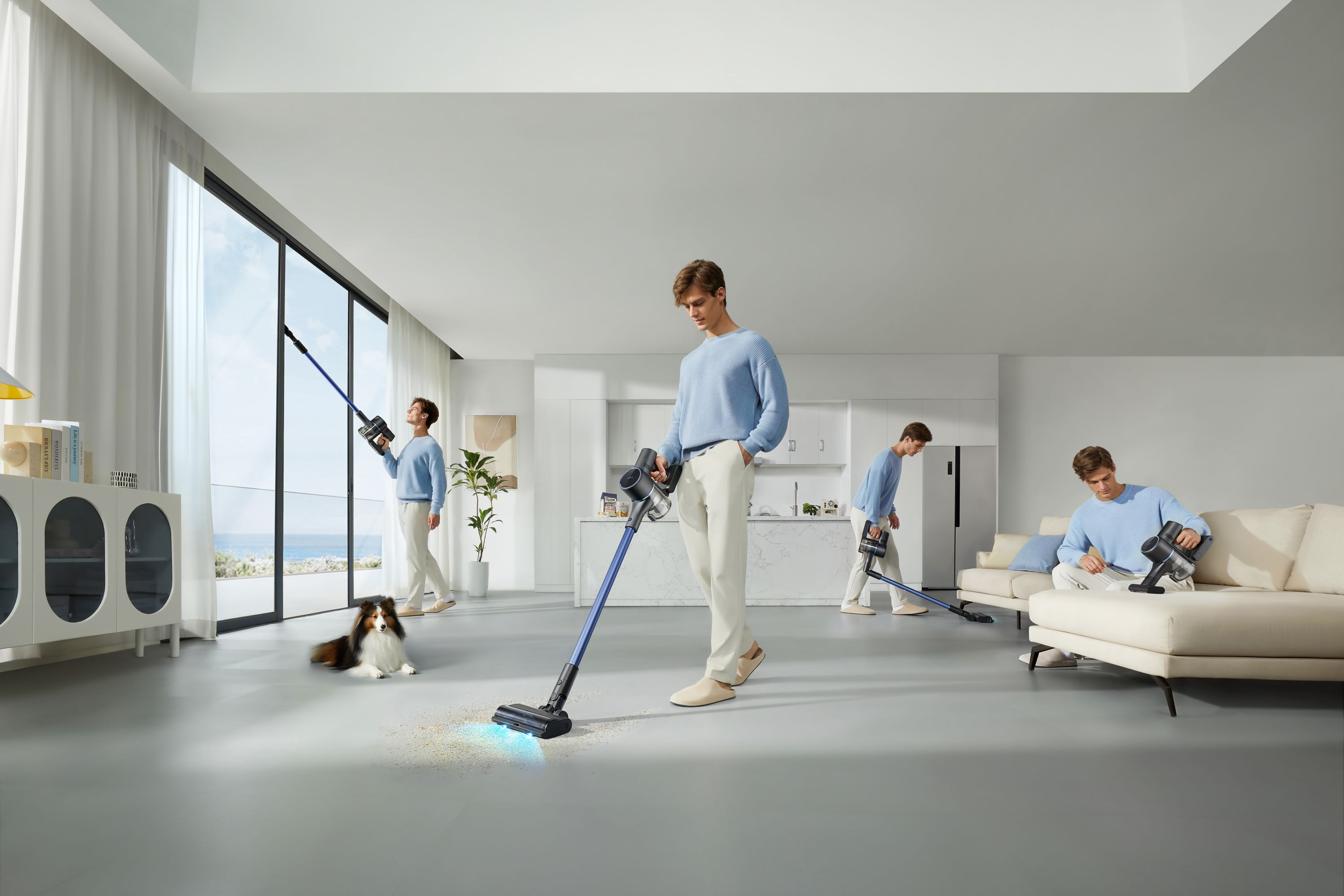 Osoba odkurzająca pokój z wieloma widokami.