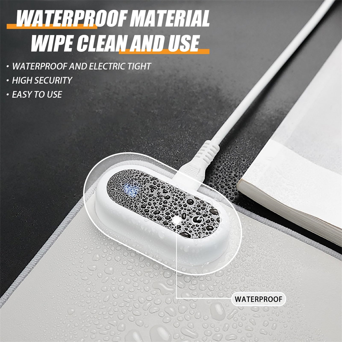 Ein weißes, wasserdichtes Gerät mit Kabel und der Aufschrift 'WATERPROOF MATERIAL'.