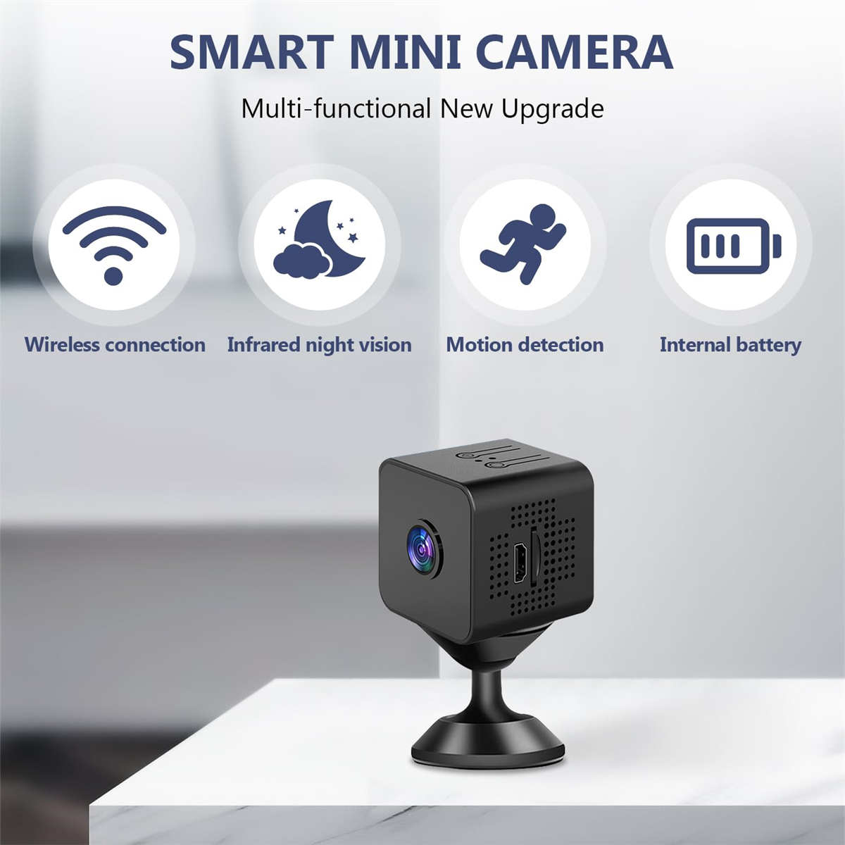 Eine schwarze Smart Mini Kamera mit Symbolen für drahtlose Verbindung, Nachtsicht, Bewegung und Akku.