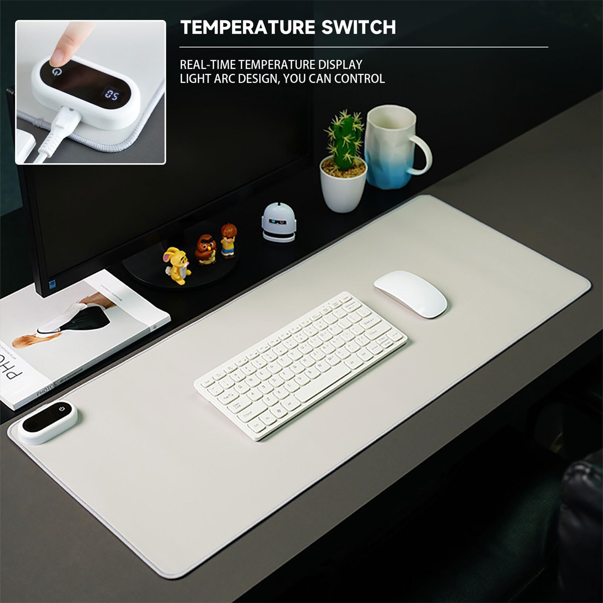Schreibtisch-Setup mit grauem Mauspads, Tastatur, Monitor und Schreibtischzubehör. Eine Temperaturregelung befindet sich links.