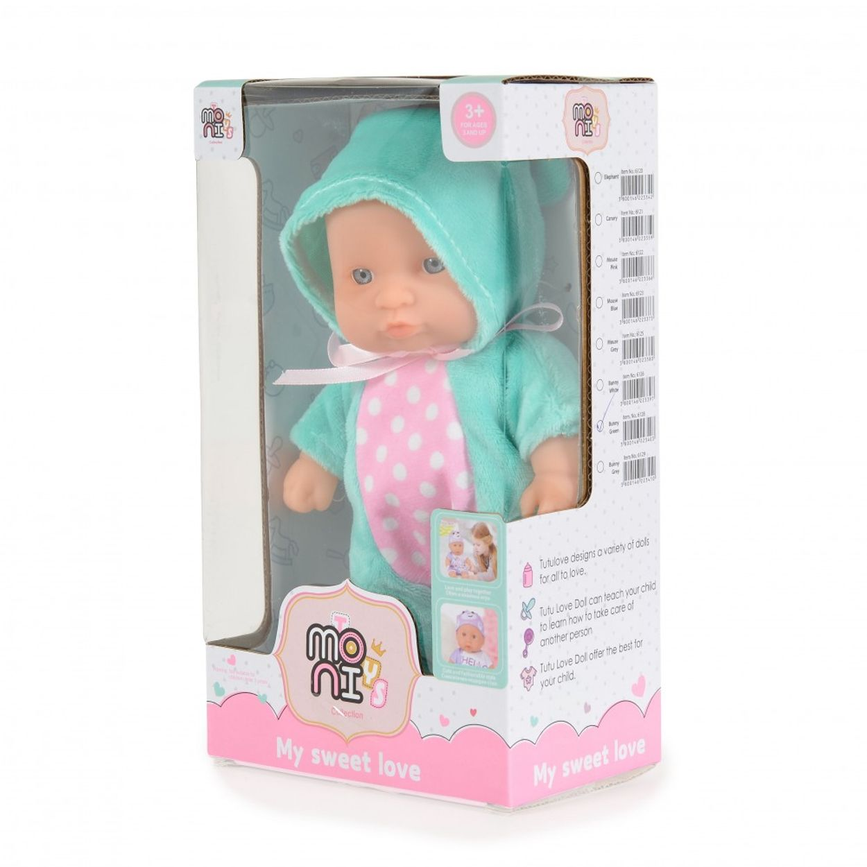 Eine Babypuppe in einer Schachtel. Die Puppe trägt ein türkisfarbenes Outfit mit rosa Punkten.