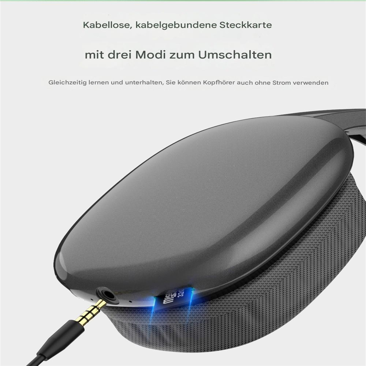 Ein Headset mit schwarzem und grauem Design. Text auf Deutsch ist sichtbar.