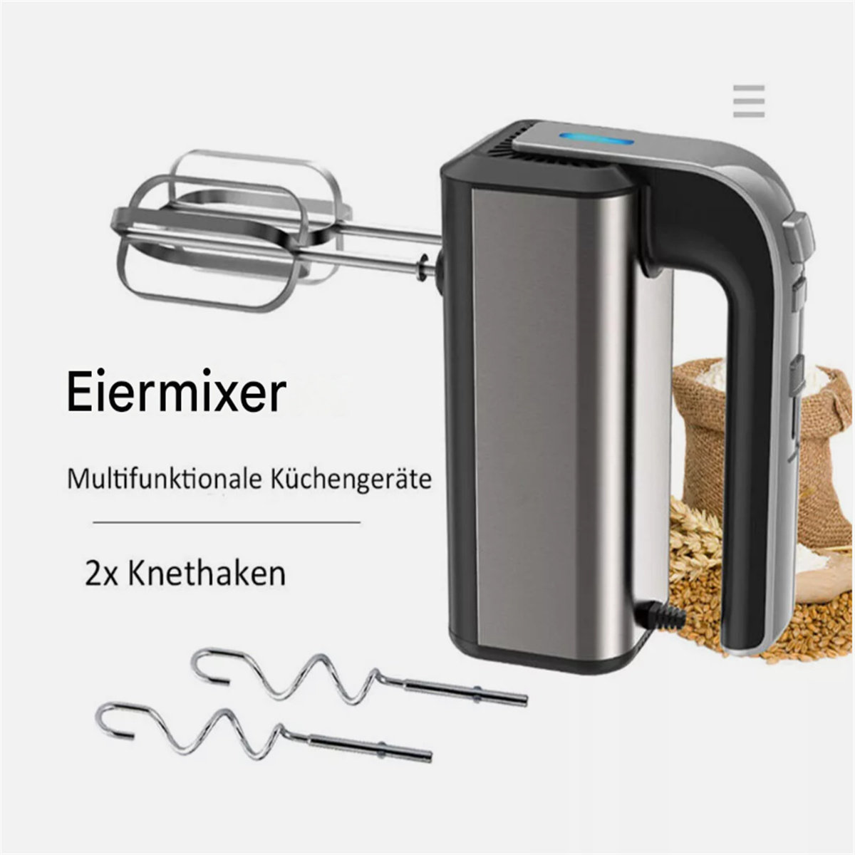Handmixer mit Aufsätzen, Metall und Schwarz, mit deutschem Text. Hintergrund mit Weizen und einem Sack.