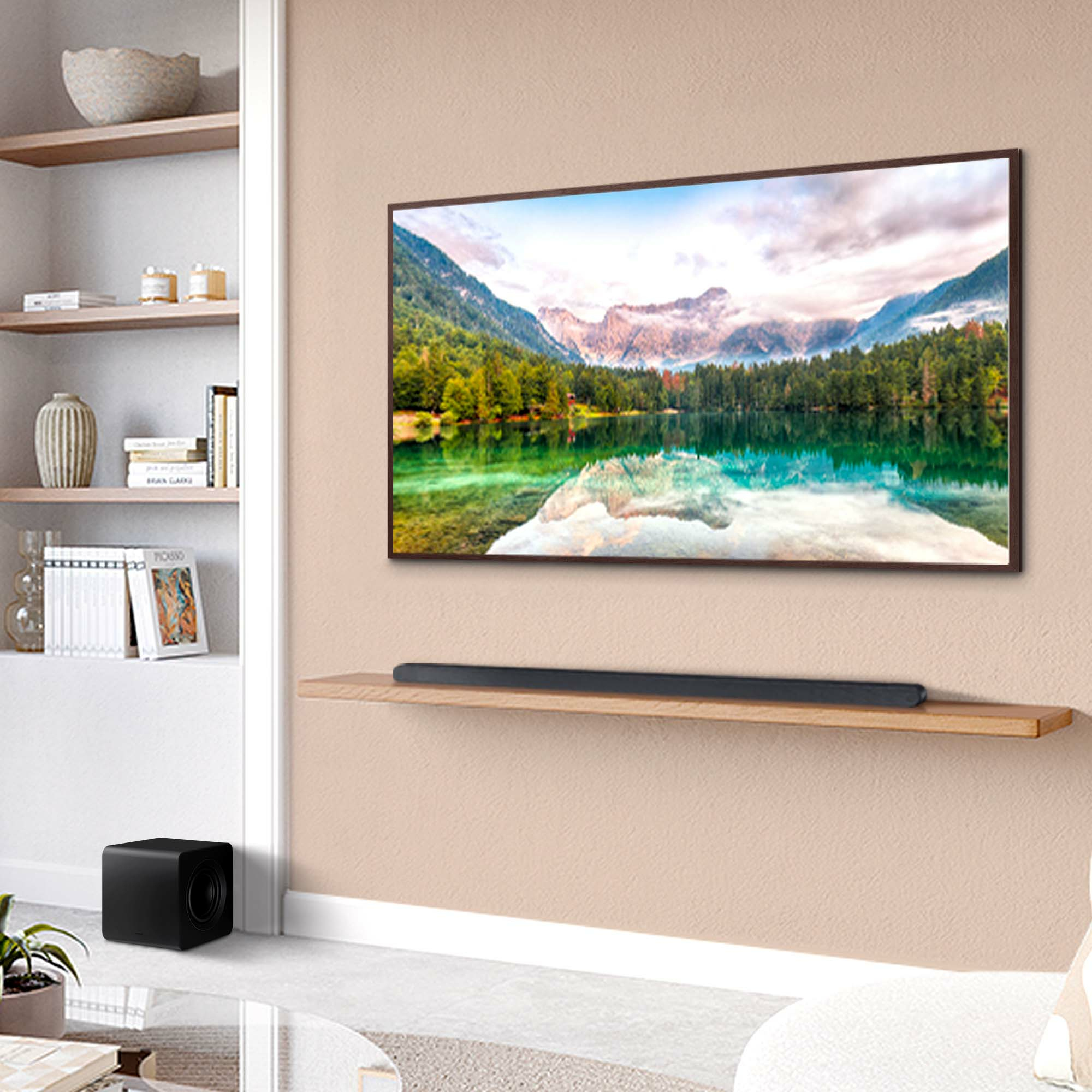 A living room with a TV displaying a mountain and lake scene and a soundbar.