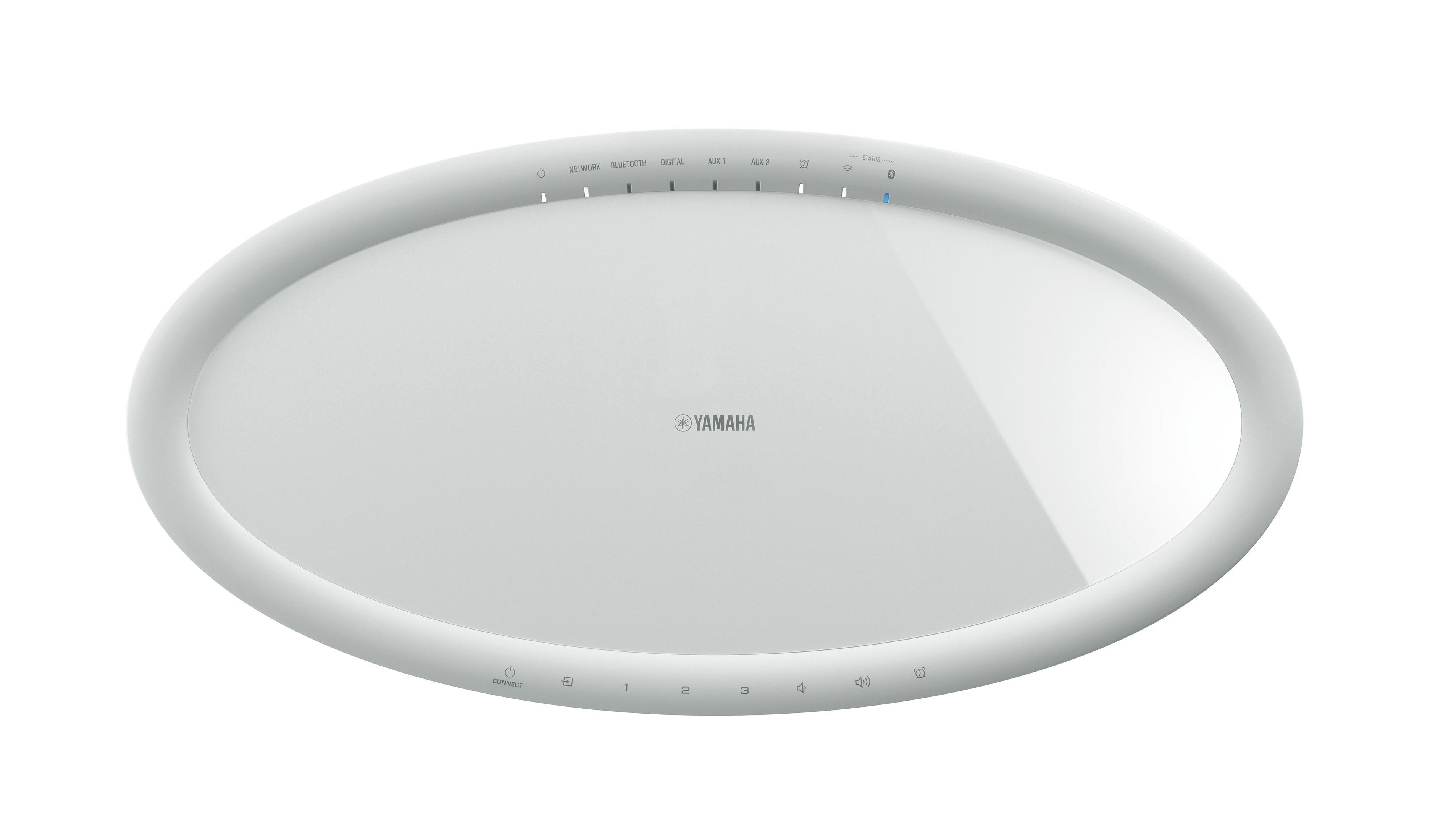 Weißer, oval geformter Lautsprecher. Hat ein zentrales Logo und Touch-Bedienelemente am Rand.