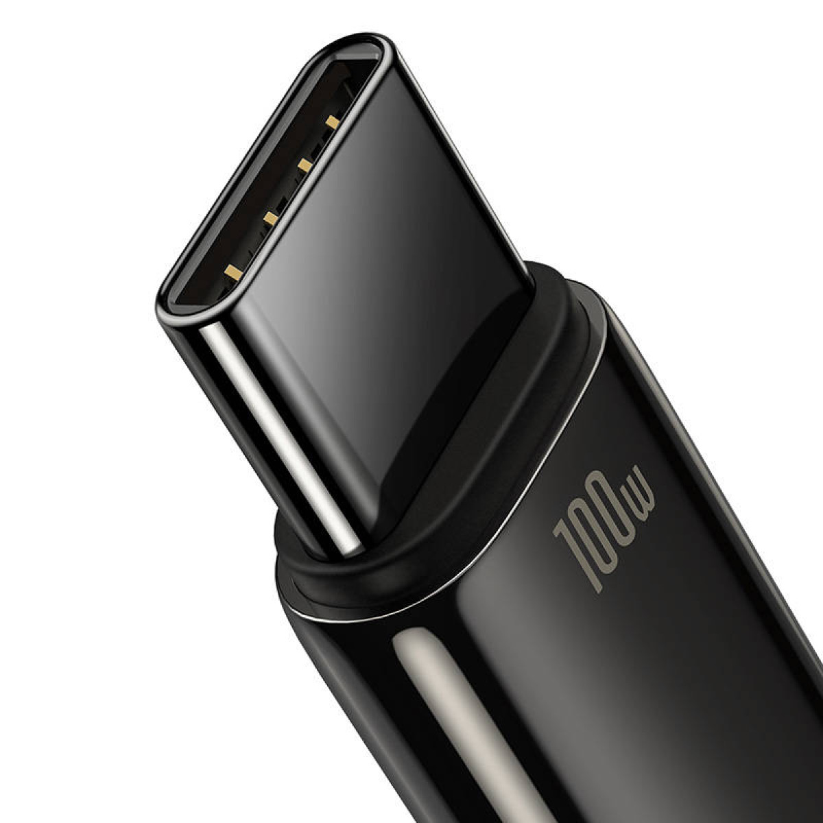 Zbliżenie czarnego kabla ładującego USB-C. Ma napis '100w'.
