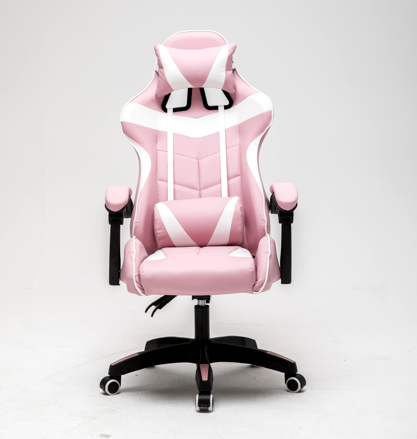 Roze gamingstoel met witte accenten, hoofdsteun en lendensteun. Zwarte basis.