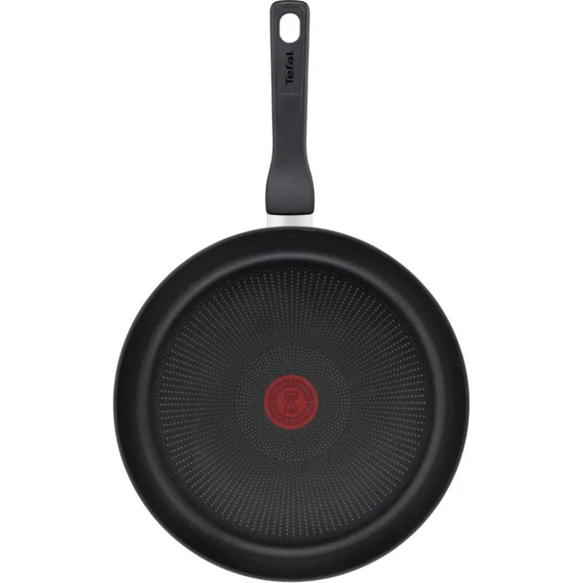 Black frying pan with a red circle in the center and a black handle.