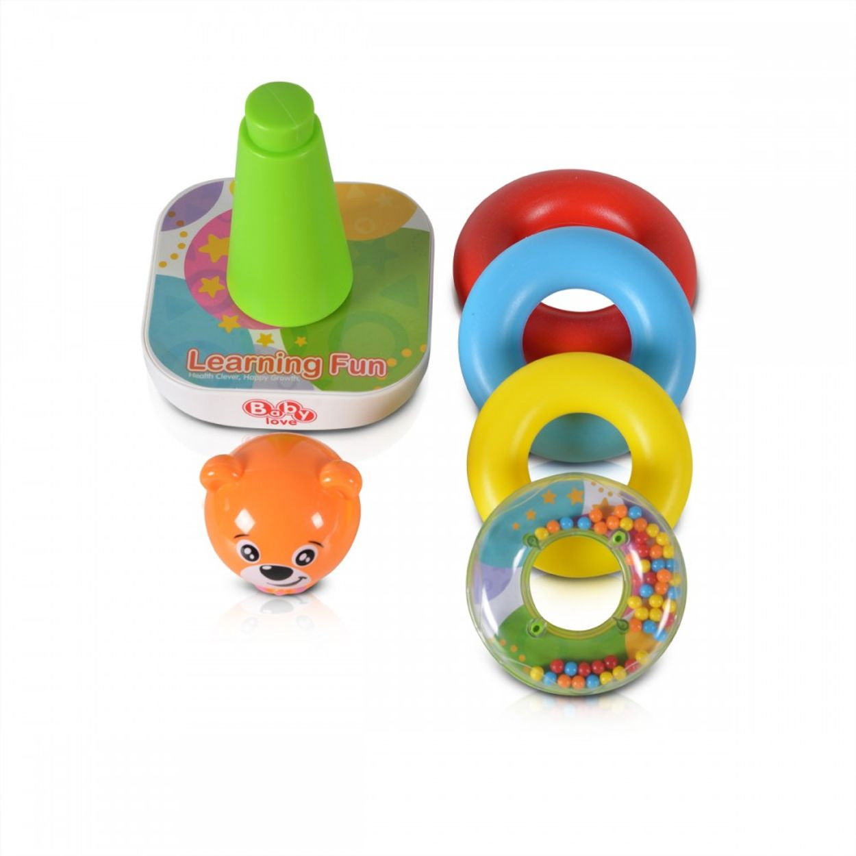 Stapelturm mit bunten Ringen, einem Bären und einem grünen Kegel. Weißer Hintergrund.