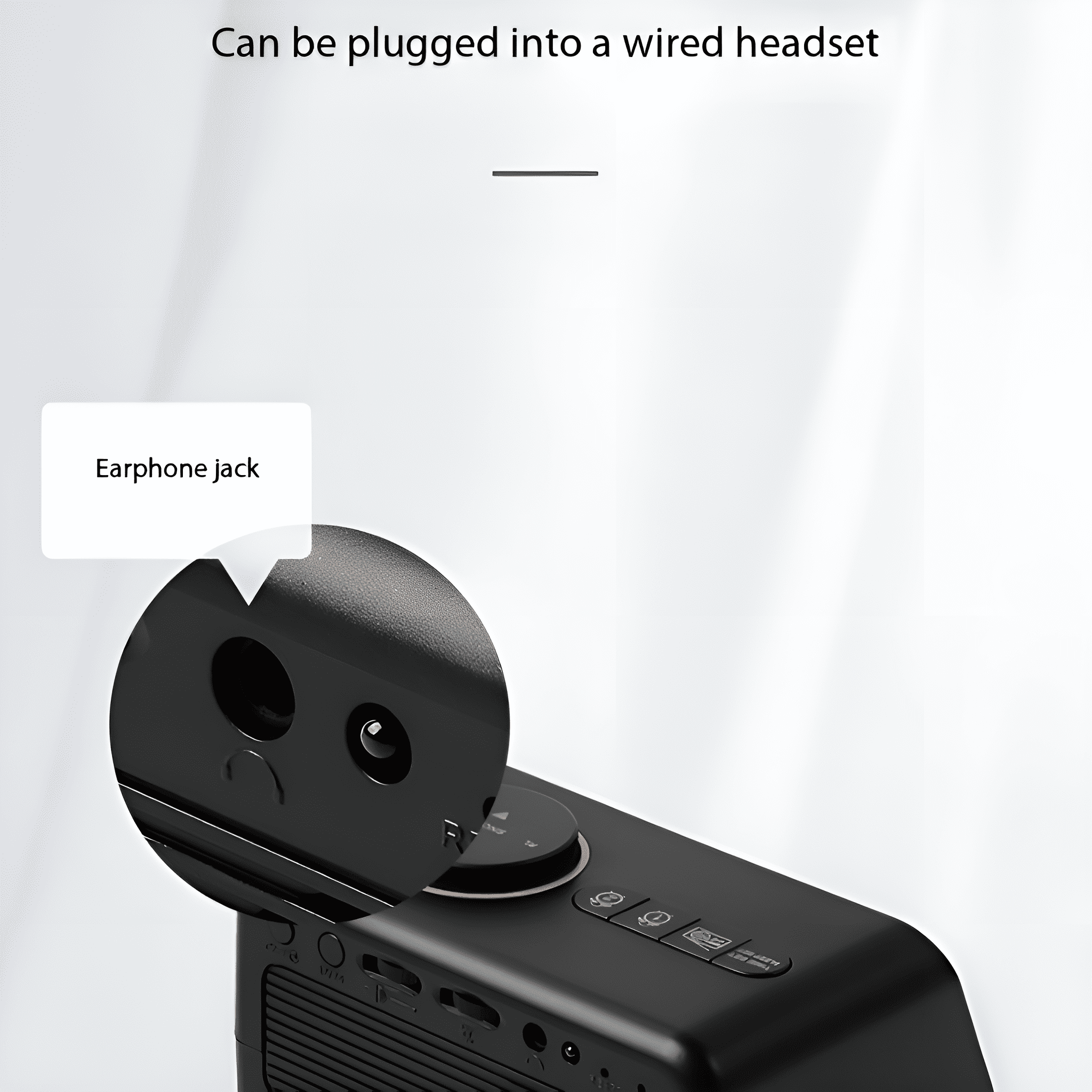 Schwarzes Gerät mit Kopfhöreranschluss. Text zeigt, dass es an ein kabelgebundenes Headset angeschlossen werden kann.