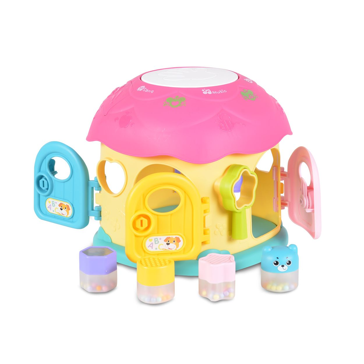 Buntes Spielzeughaus mit Blöcken und Formen. Rosa Dach, gelbe Wände.
