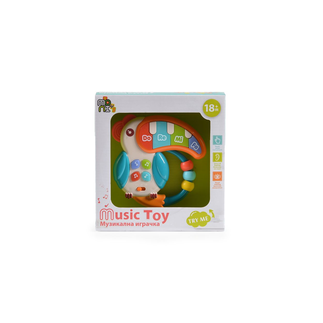 Spielzeug-Musikpapagei in einer Box. Do Re Mi Noten auf dem Spielzeug.