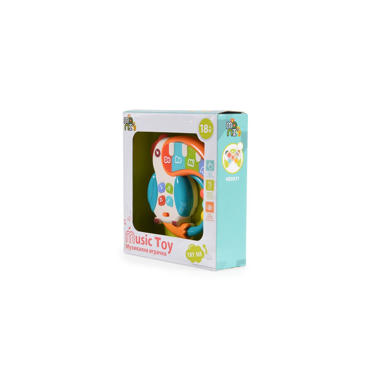 Ein Spielzeug-Tukan in einer Box, mit dem Text 'Music Toy' und der Altersangabe '18+'.