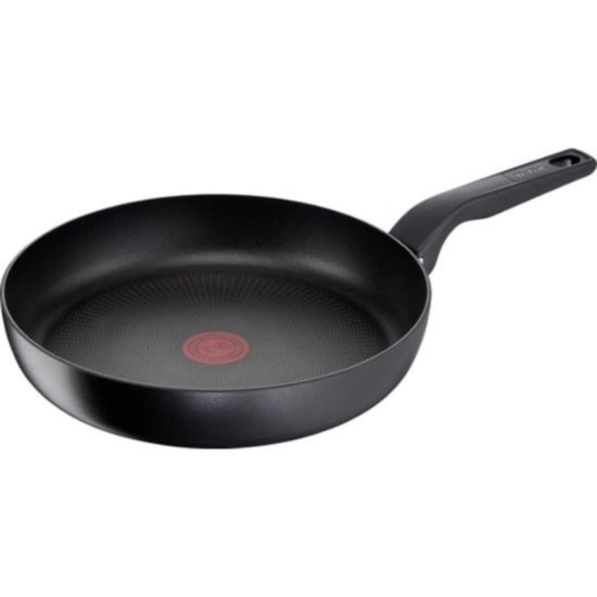 Black frying pan with a long handle, red circle in the center, on white background.