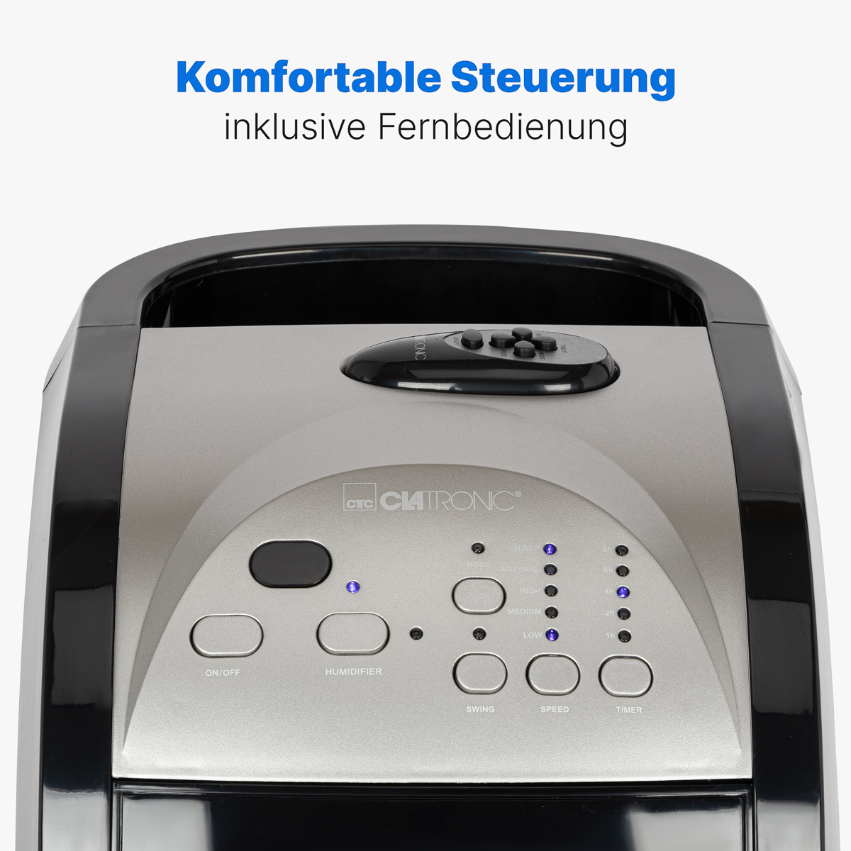 Un humidificador de aire negro y plateado con panel de control sobre un fondo blanco.