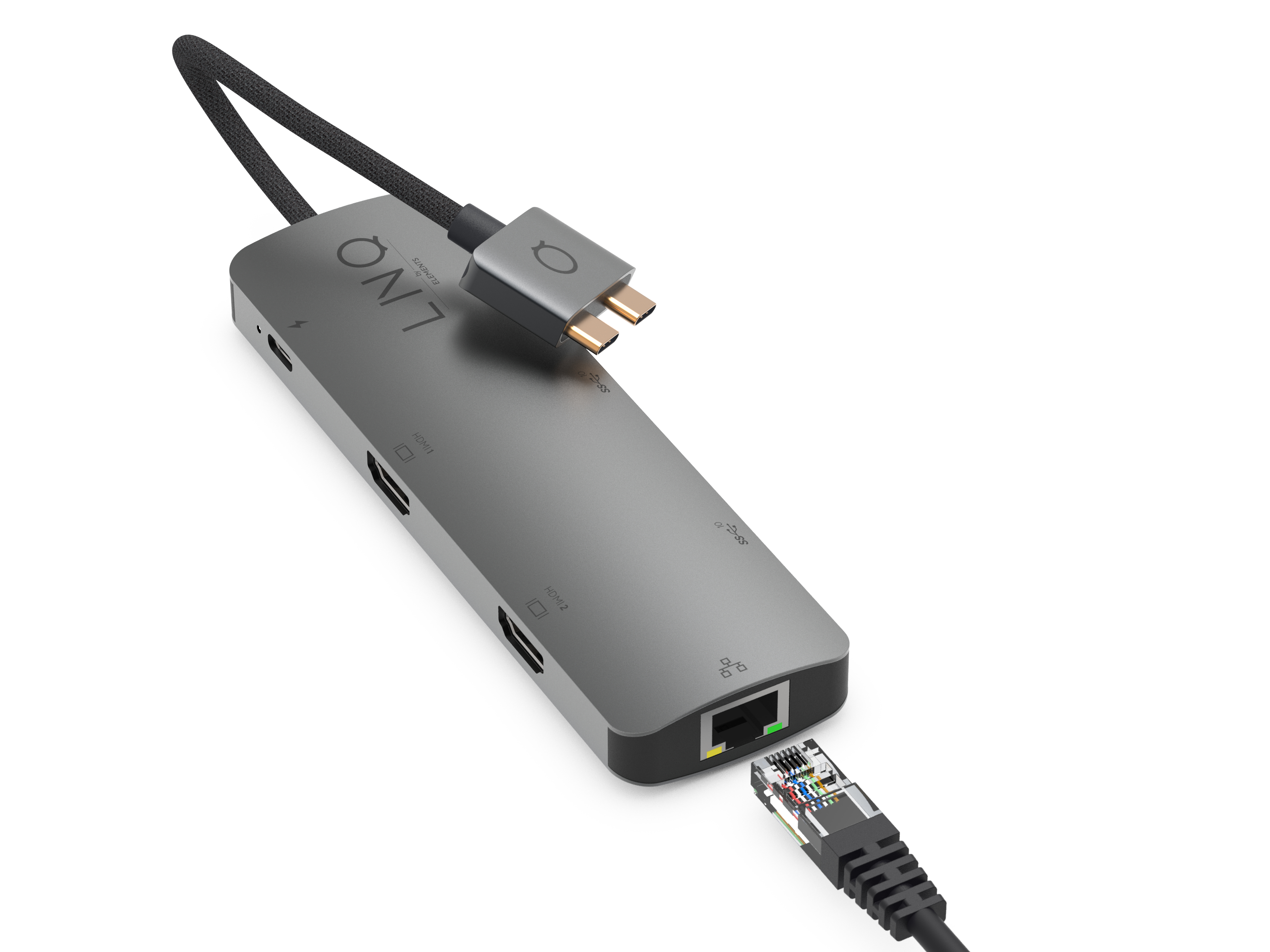 Ein silberner Hub mit mehreren Anschlüssen und einem schwarzen Kabel mit Stecker.