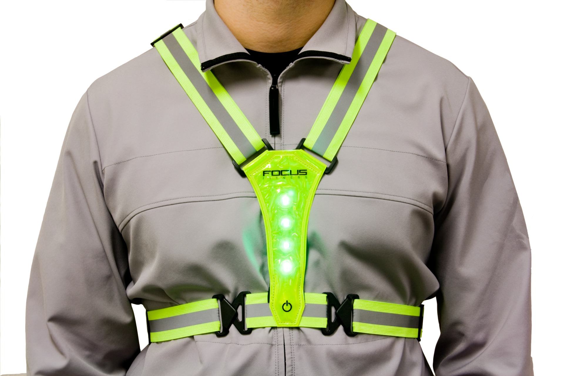Persoon die een fluorescerend groen en reflecterend veiligheidsvest draagt met LED-verlichting.