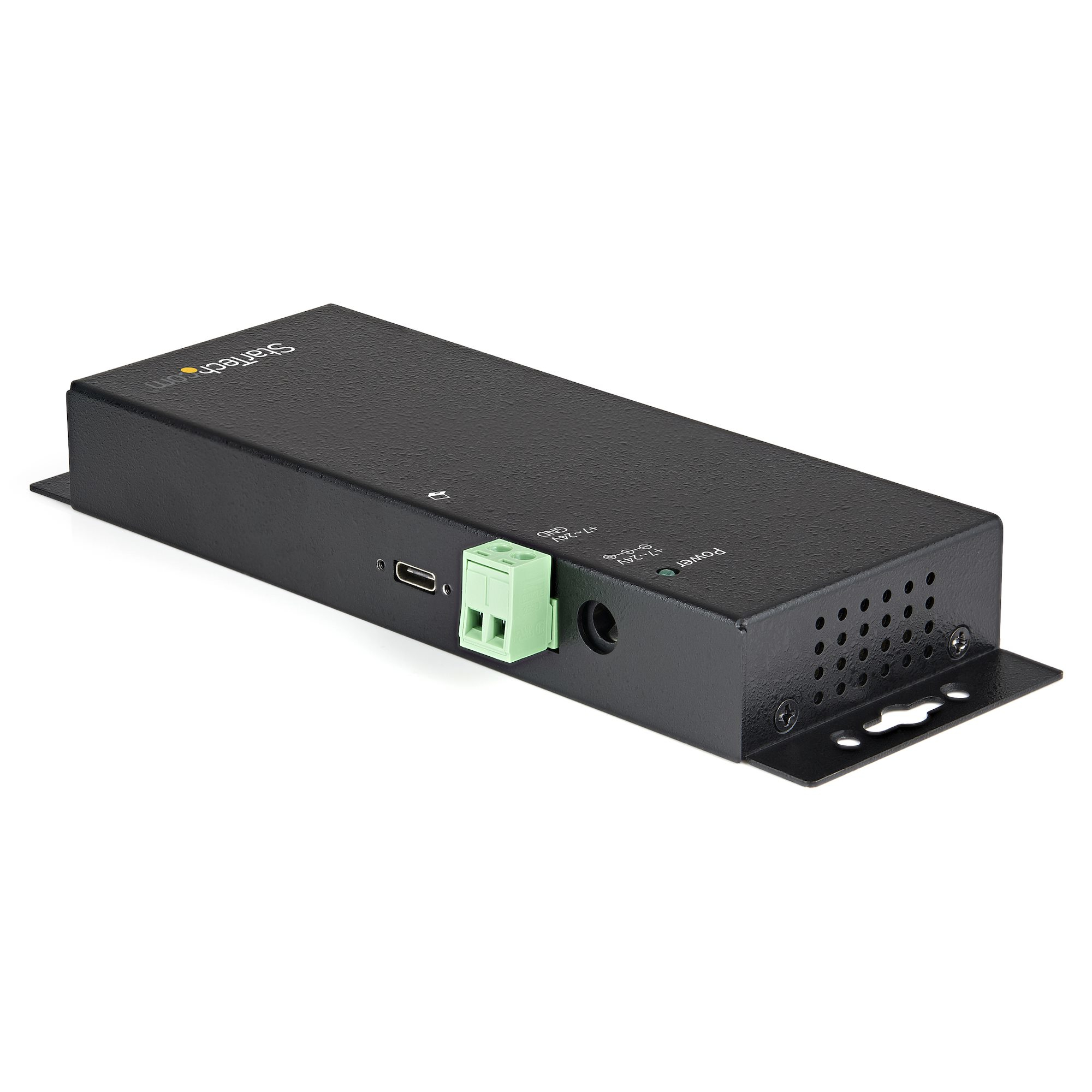 Caja StarTech negra rectangular con puerto, conector verde e indicador de encendido, sobre una superficie blanca.