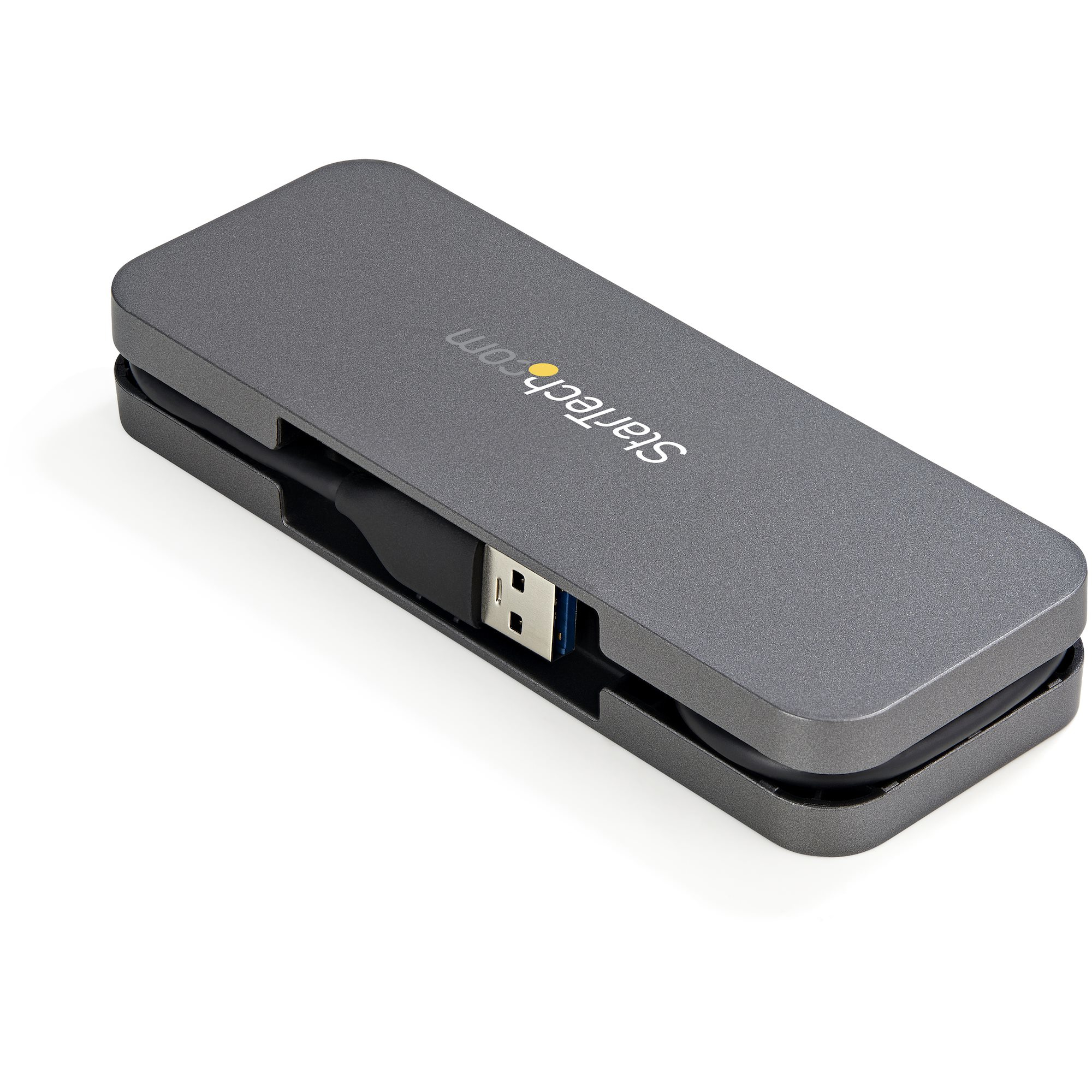 Hub USB StarTech argentato. Design compatto con connettore USB. L'hub è chiuso.