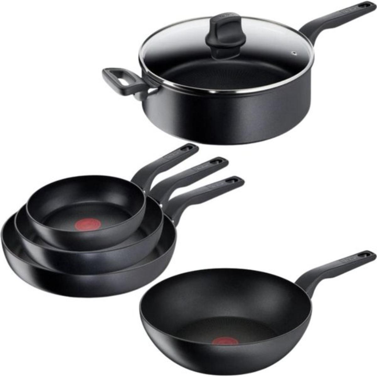 A collection of black cooking pans of various sizes and shapes, including a wok and a pan with a lid.
