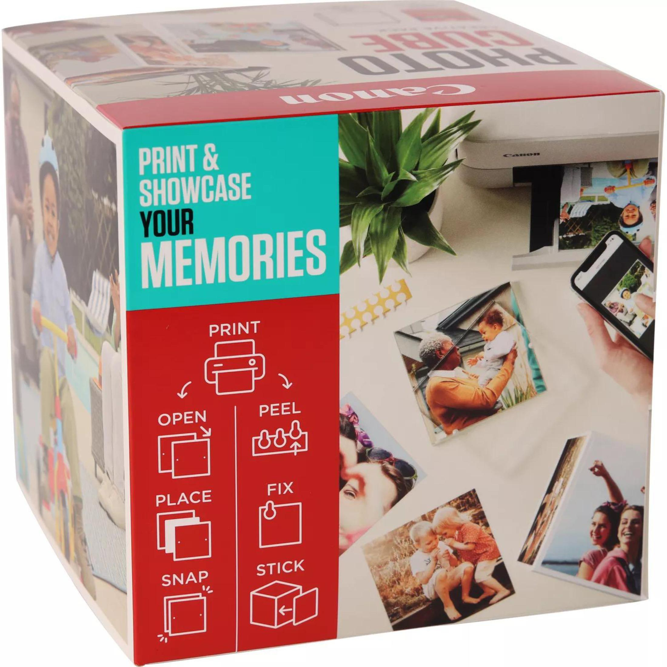 Scatola Canon Photo Cube con istruzioni per stampare, sbucciare, posizionare, fissare, scattare e incollare foto.