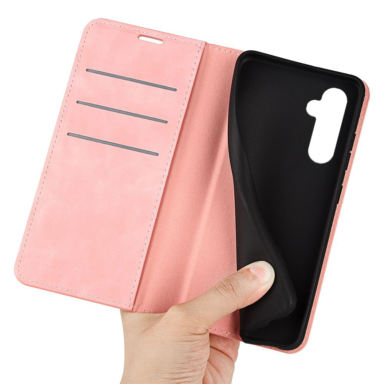 Hand houdt roze telefoonhoes open, zwarte binnenkant, telefoon verwijderd.