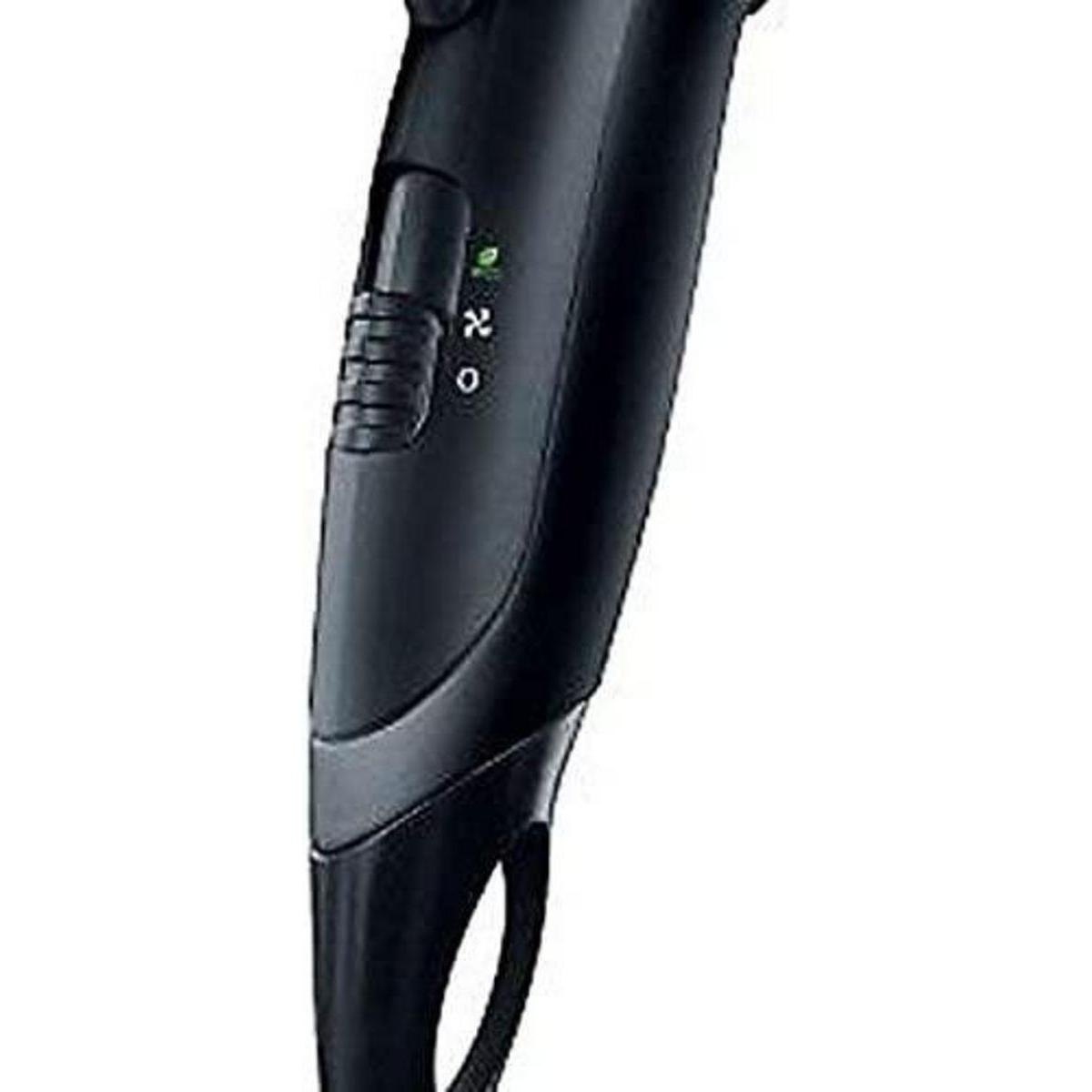 Tondeuse à cheveux électrique noire avec molette de réglage et voyants verts.